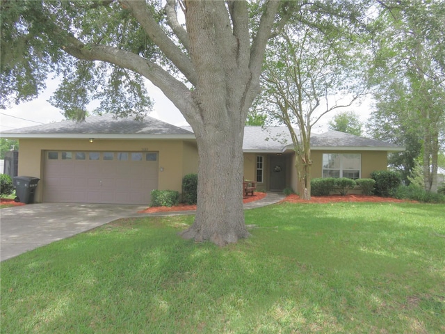 5083 SE 26th St, Ocala, FL 34480 - view of front facade with stucco siding, concrete driveway, and a garage