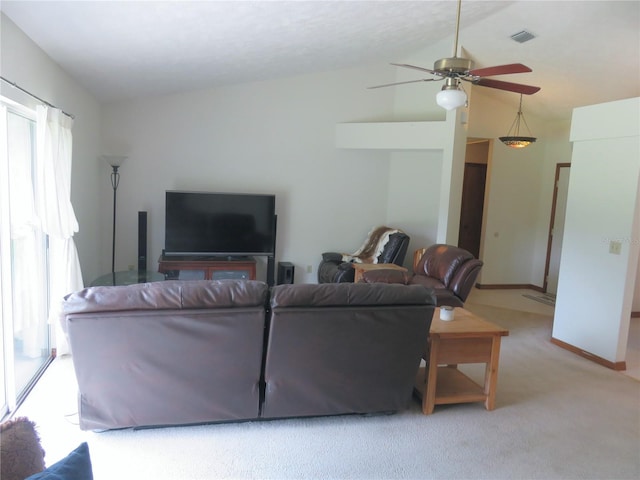5083 SE 26th St, Ocala, FL 34480 - living room with lofted ceiling, healthy amount of natural light, light carpet, and ceiling fan