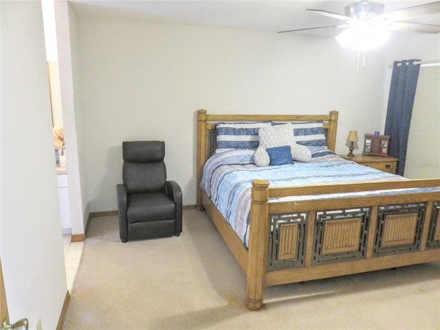 5083 SE 26th St, Ocala, FL 34480 - bedroom featuring baseboards, a ceiling fan, and light carpet
