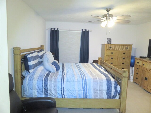 5083 SE 26th St, Ocala, FL 34480 - bedroom with light colored carpet and ceiling fan