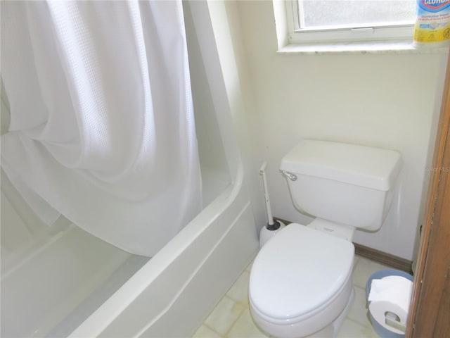 5083 SE 26th St, Ocala, FL 34480 - bathroom featuring toilet and shower / tub combo with curtain