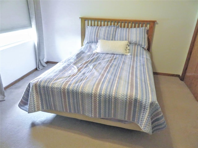 5083 SE 26th St, Ocala, FL 34480 - carpeted bedroom with baseboards