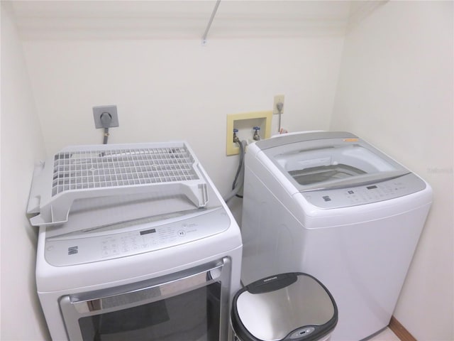 5083 SE 26th St, Ocala, FL 34480 - washroom with washer and clothes dryer