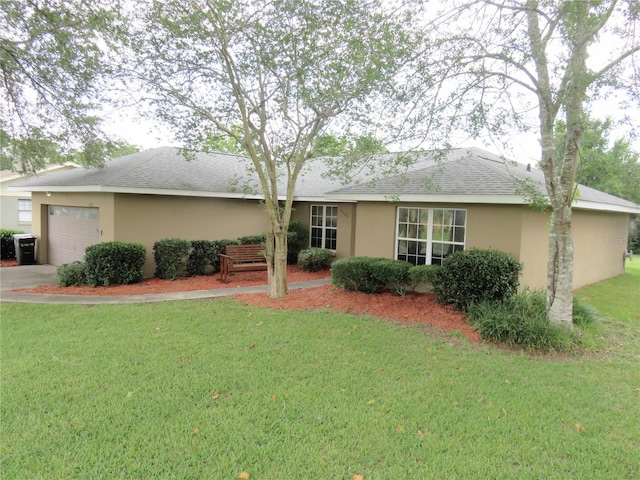 5083 SE 26th St, Ocala, FL 34480 - single story home featuring an attached garage, a front lawn, stucco siding, and concrete driveway