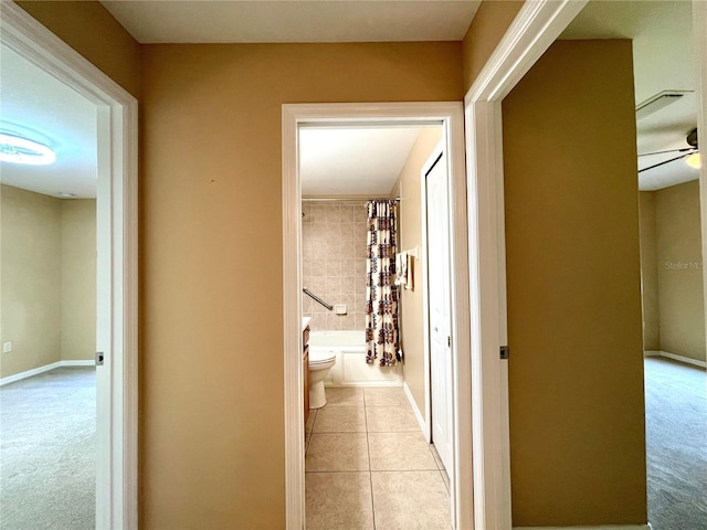 16405 SW 14th Avenue Rd, Ocala, FL 34473 - hall with light tile patterned flooring and baseboards