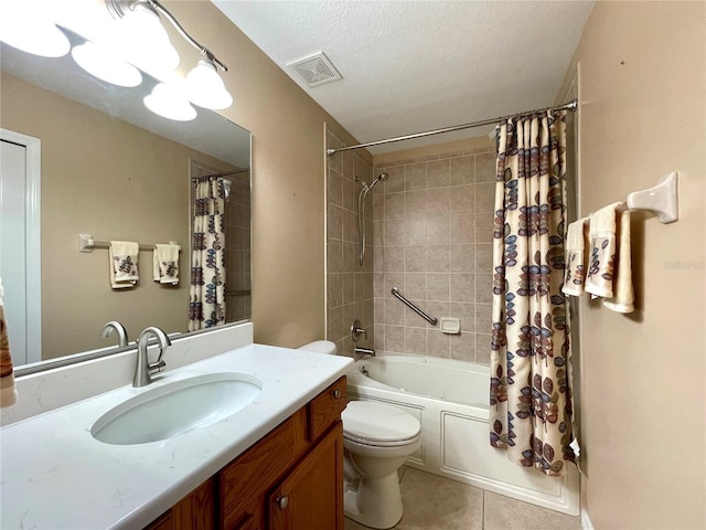 16405 SW 14th Avenue Rd, Ocala, FL 34473 - bathroom with toilet, tile patterned floors, vanity, shower / bath combo, and a textured ceiling