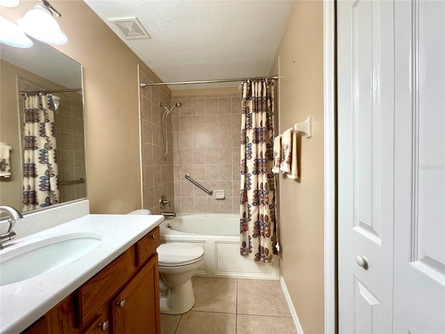 16405 SW 14th Avenue Rd, Ocala, FL 34473 - bathroom featuring tile patterned flooring, vanity, toilet, shower / bath combination with curtain, and a textured ceiling