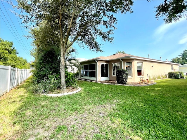 16405 SW 14th Avenue Rd, Ocala, FL 34473 - rear view of house with stucco siding
