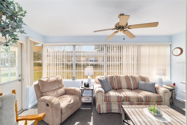 8420 SW 93rd Ln Unit E, Ocala, FL 34476 - living room with carpet floors, a ceiling fan, and plenty of natural light