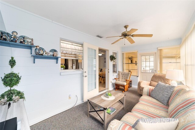 8420 SW 93rd Ln Unit E, Ocala, FL 34476 - living room with carpet flooring, ceiling fan, and french doors