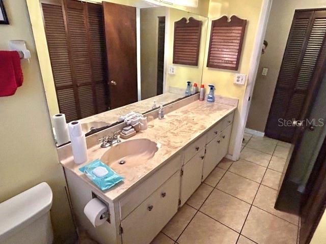20100 SW 95th St, Dunnellon, FL 34431 - bathroom featuring toilet, a closet, and tile patterned flooring