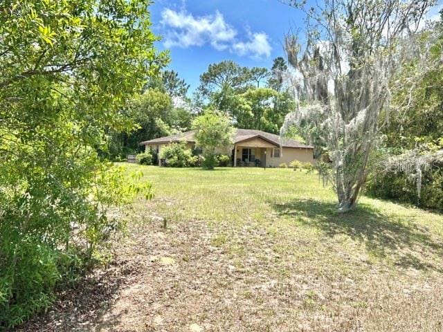 20100 SW 95th St, Dunnellon, FL 34431 - view of grassy yard