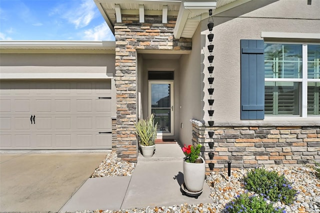 6405 SW 88th Loop, Ocala, FL 34476 - property entrance with stone siding, stucco siding, driveway, and a garage
