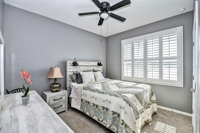 6405 SW 88th Loop, Ocala, FL 34476 - carpeted bedroom with baseboards and ceiling fan