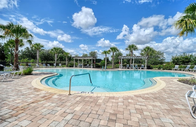 6405 SW 88th Loop, Ocala, FL 34476 - community pool featuring a pergola and a patio