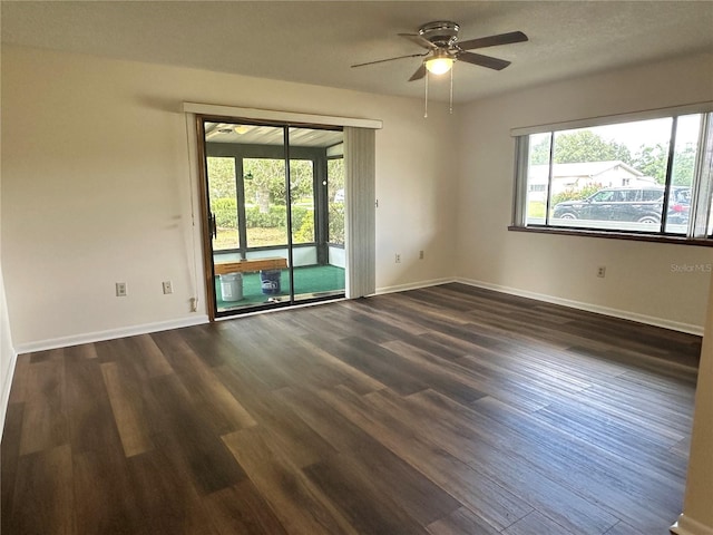 10080 SW 97th Ct, Ocala, FL 34481 - spare room featuring plenty of natural light, a ceiling fan, and dark wood-style flooring