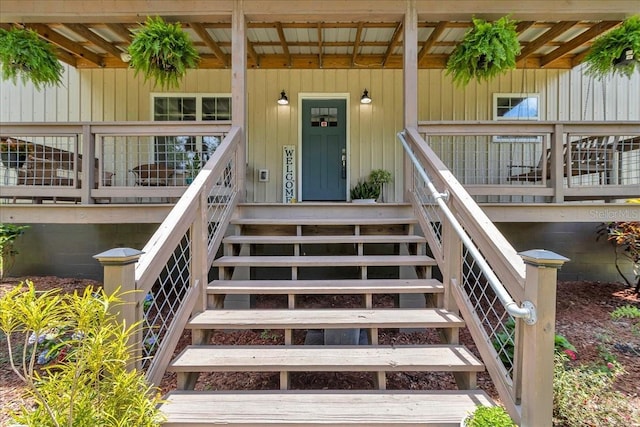 12080 SE Sunset Harbor Rd, Weirsdale, FL 32195 - view of exterior entry with covered porch