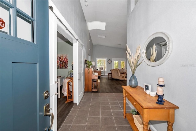 12080 SE Sunset Harbor Rd, Weirsdale, FL 32195 - entryway featuring vaulted ceiling, dark tile patterned floors, and french doors