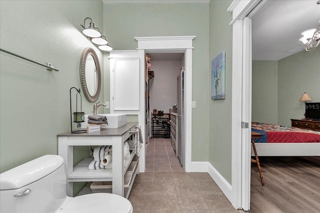 12080 SE Sunset Harbor Rd, Weirsdale, FL 32195 - full bathroom featuring ensuite bath, vanity, and tile patterned floors