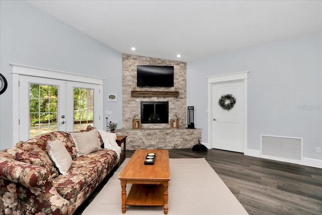 12080 SE Sunset Harbor Rd, Weirsdale, FL 32195 - living area featuring wood finished floors, french doors, a fireplace, and recessed lighting