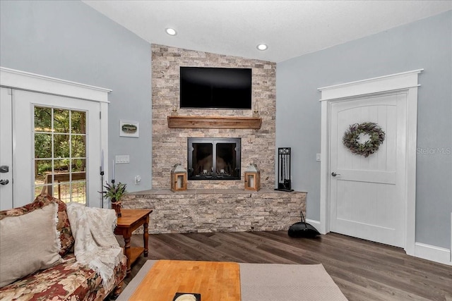 12080 SE Sunset Harbor Rd, Weirsdale, FL 32195 - living room with wood finished floors, a fireplace, and lofted ceiling