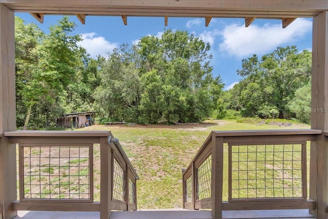 12080 SE Sunset Harbor Rd, Weirsdale, FL 32195 - wooden deck with a yard
