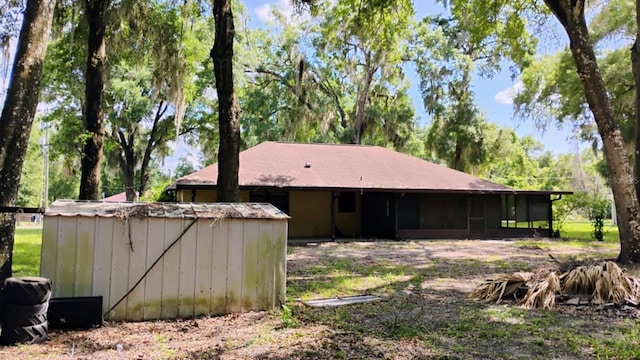 8485 E Hampton Point Rd, Inverness, FL 34450 - rear view of house featuring a sunroom