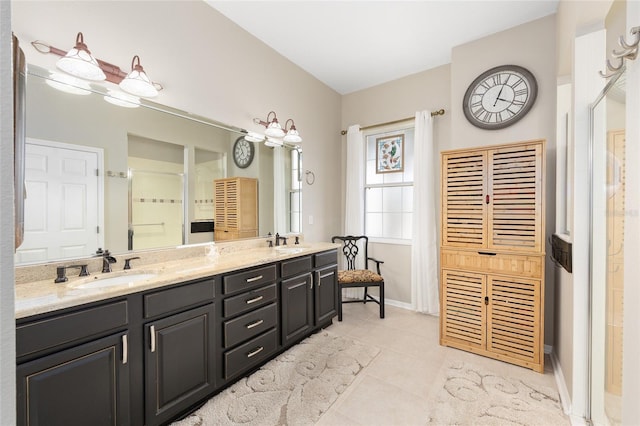 8737 SW 83rd Cir, Ocala, FL 34481 - full bathroom with double vanity, tile patterned flooring, a shower, and baseboards