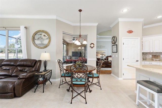 8737 SW 83rd Cir, Ocala, FL 34481 - dining space featuring crown molding, light tile patterned floors, baseboards, and recessed lighting