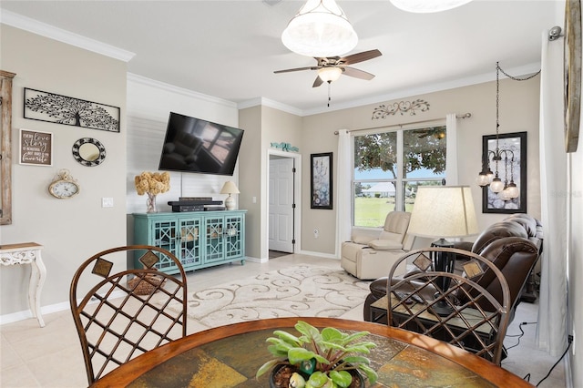 8737 SW 83rd Cir, Ocala, FL 34481 - living area featuring a ceiling fan, baseboards, crown molding, and tile patterned flooring