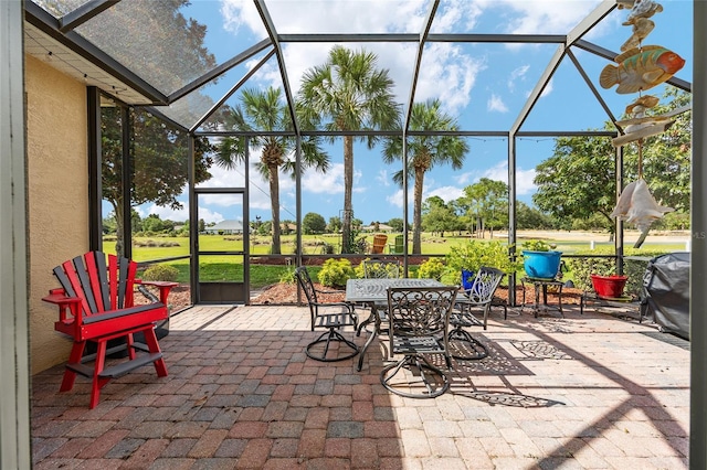 8737 SW 83rd Cir, Ocala, FL 34481 - view of patio featuring glass enclosure