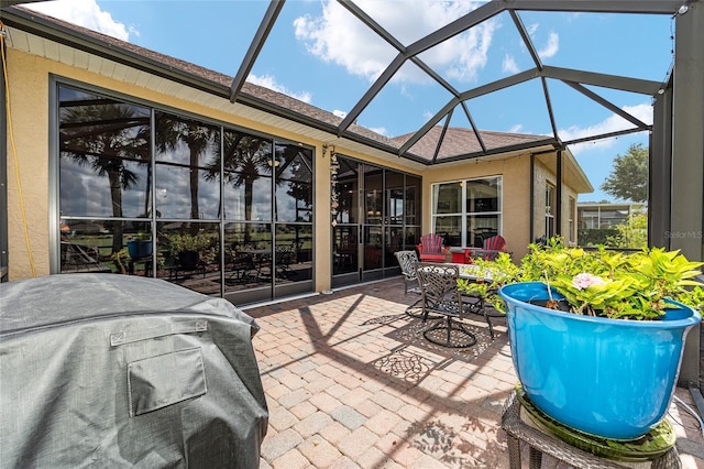 8737 SW 83rd Cir, Ocala, FL 34481 - view of patio featuring area for grilling and a lanai