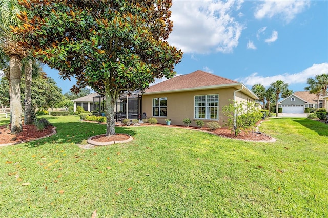 8737 SW 83rd Cir, Ocala, FL 34481 - back of house with stucco siding and a lawn