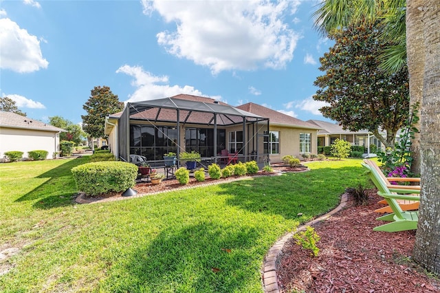 8737 SW 83rd Cir, Ocala, FL 34481 - rear view of house featuring a yard and a lanai