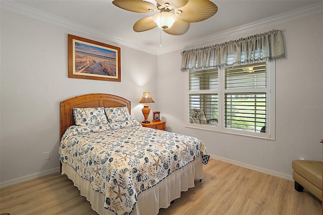 8772 SE 130th Loop, Summerfield, FL 34491 - bedroom with light wood-type flooring, baseboards, ornamental molding, and a ceiling fan