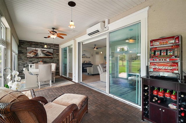 8772 SE 130th Loop, Summerfield, FL 34491 - sunroom featuring a wall unit AC and ceiling fan