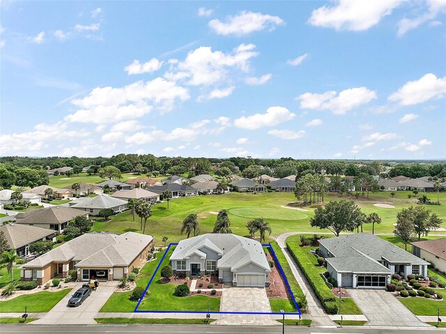 8772 SE 130th Loop, Summerfield, FL 34491 - aerial perspective of suburban area with property parcel outlined and a local golf course