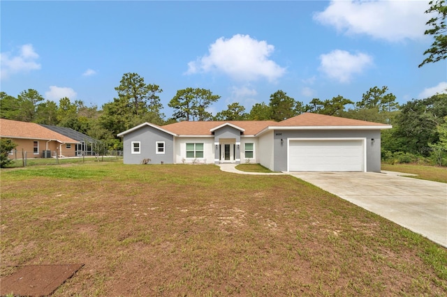 14550 SW 61st Ct, Ocala, FL 34473 - ranch-style house featuring driveway, an attached garage, and stucco siding