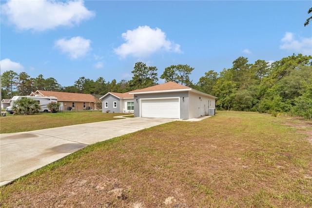 14550 SW 61st Ct, Ocala, FL 34473 - ranch-style house featuring a front yard, stucco siding, driveway, and central AC unit