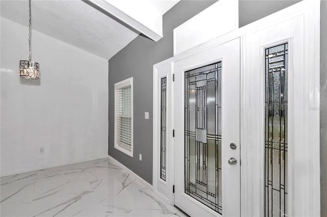 14550 SW 61st Ct, Ocala, FL 34473 - entryway featuring baseboards and marble finish flooring