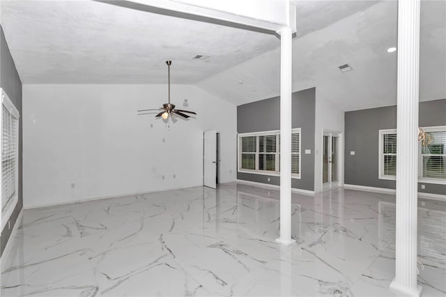 14550 SW 61st Ct, Ocala, FL 34473 - unfurnished living room featuring ceiling fan, marble finish flooring, decorative columns, baseboards, and high vaulted ceiling