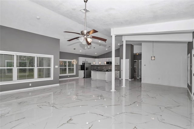 14550 SW 61st Ct, Ocala, FL 34473 - unfurnished living room with vaulted ceiling, ceiling fan, baseboards, light marble finish flooring, and recessed lighting