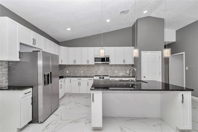 14550 SW 61st Ct, Ocala, FL 34473 - kitchen with appliances with stainless steel finishes, light marble finish flooring, a sink, lofted ceiling, and white cabinetry