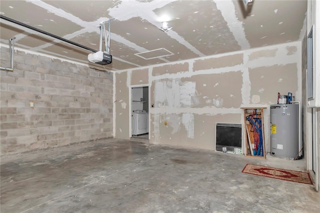 14550 SW 61st Ct, Ocala, FL 34473 - garage with water heater, washer / dryer, a garage door opener, and concrete block wall