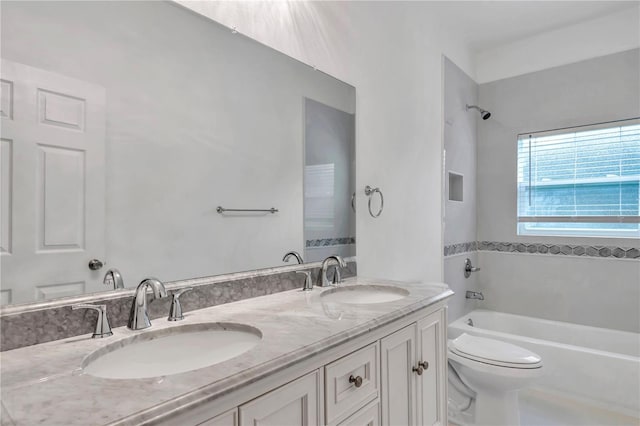 14550 SW 61st Ct, Ocala, FL 34473 - bathroom featuring toilet, double vanity, and  shower combination