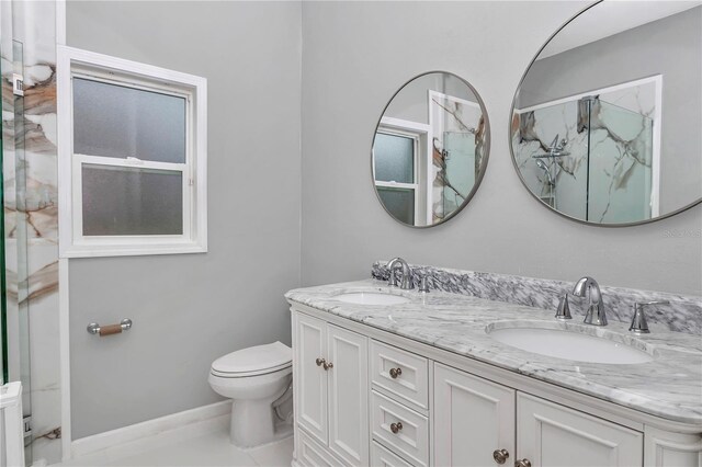14550 SW 61st Ct, Ocala, FL 34473 - bathroom featuring toilet and double vanity