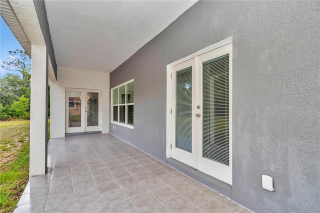 14550 SW 61st Ct, Ocala, FL 34473 - view of patio with french doors