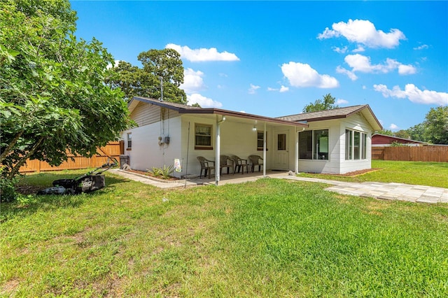 5005 NE 22nd Ave, Ocala, FL 34479 - back of house featuring a patio area