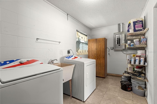 5005 NE 22nd Ave, Ocala, FL 34479 - laundry area with electric panel, a textured ceiling, light tile patterned flooring, and independent washer and dryer