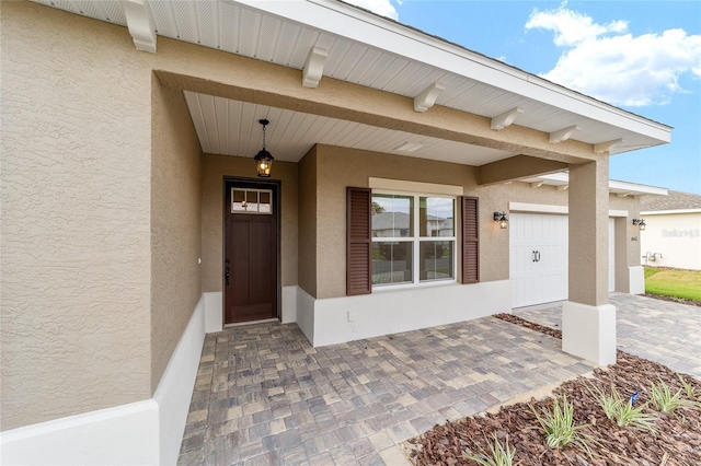 10562 SW 96th Lane Rd, Ocala, FL 34481 - view of exterior entry with stucco siding
